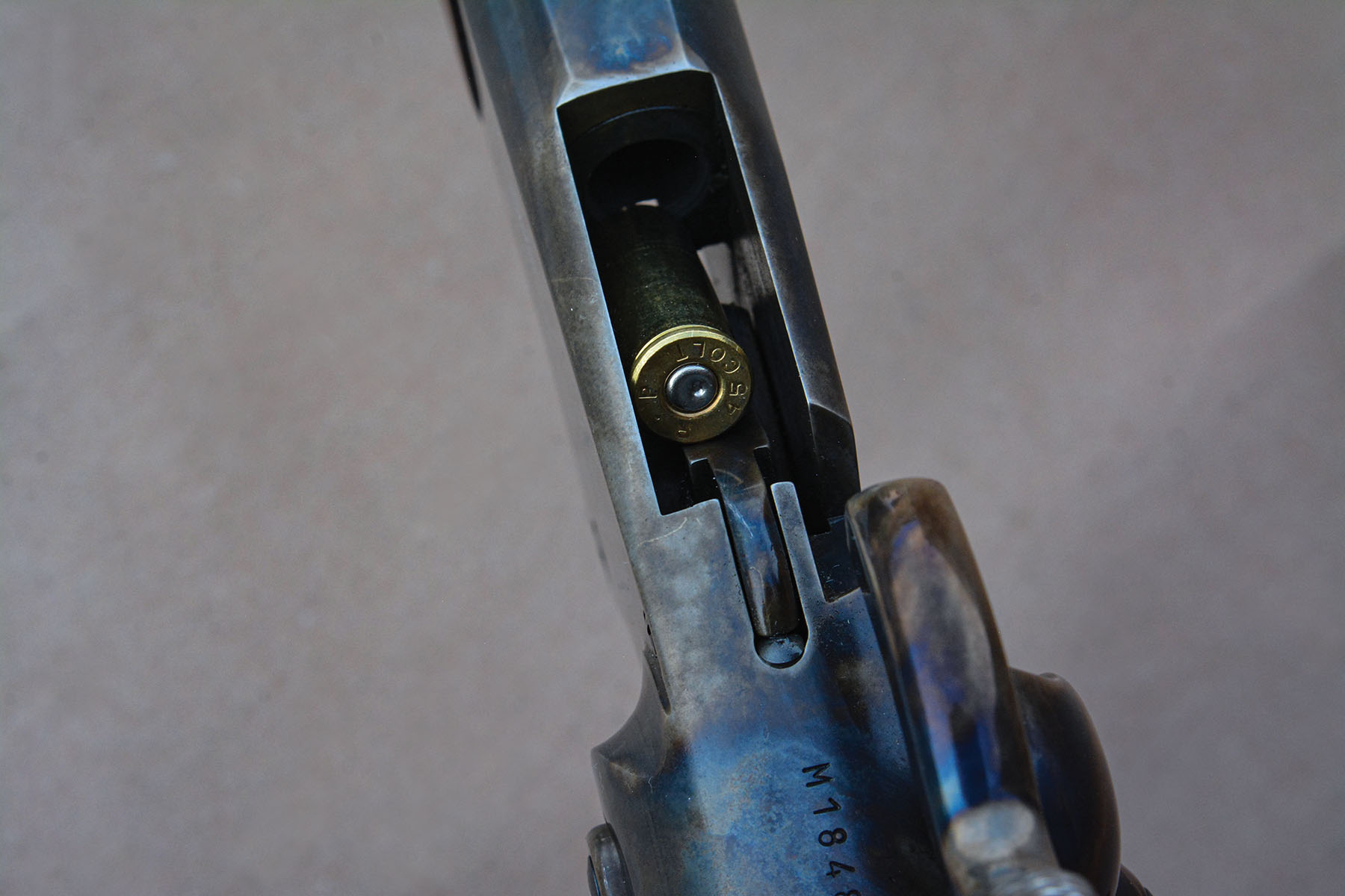 This fired case will be fully thrown from the action when the breech block is closed.